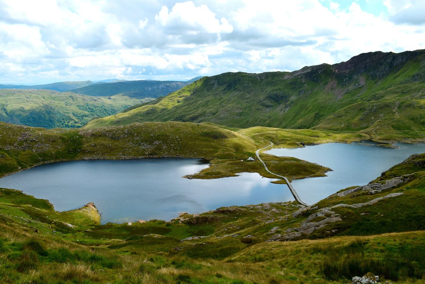 Clear alpine lake protected by local conservation