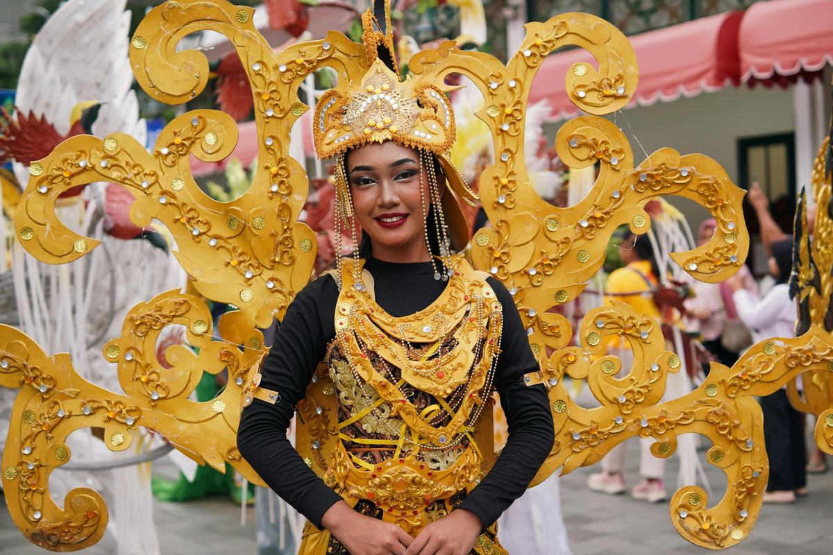 Performer in traditional golden costume